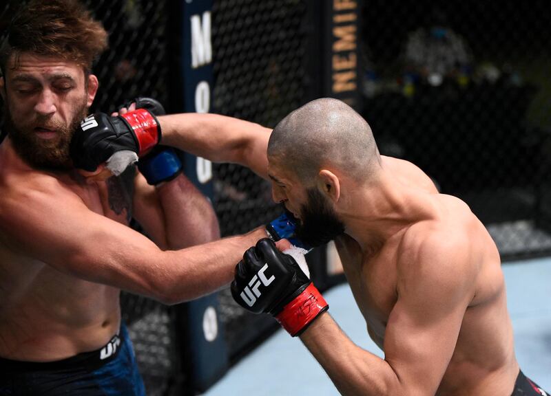 LAS VEGAS, NEVADA - SEPTEMBER 19: (R-L) Khamzat Chimaev of Chechnya punches Gerald Meerschaert in their middleweight bout during the UFC Fight Night event at UFC APEX on September 19, 2020 in Las Vegas, Nevada. (Photo by Chris Unger/Zuffa LLC)