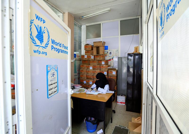 EDITORS NOTE: Graphic content / A physician works in her office at a malnutrition treatment centre in al-Sabeen Maternal Hospital in the Huthi-rebel-held Yemeni capital Sanaa on June 22, 2019. Some Yemenis in Sanaa fear starvation after the World Food Programme announced partial suspension of aid to the rebel-held capital. Citing problems with "diversion of food" from the neediest, the UN agency said on June 20 that it would initially only target Sanaa city, controlled by the Iran-aligned Huthis. The decision will affect 850,000 people. Nutrition programmes will remain in place for malnourished children, pregnant women and nursing mothers. / AFP / Mohammed HUWAIS
