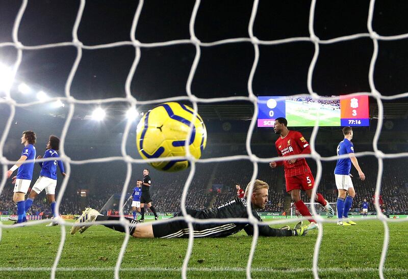 LEICESTER, ENGLAND - DECEMBER 26: Kasper Schmeichel of Leicester City reacts after Roberto Firminho of Liverpool scores his sides third goal during the Premier League match between Leicester City and Liverpool FC at The King Power Stadium on December 26, 2019 in Leicester, United Kingdom. (Photo by Alex Pantling/Getty Images)