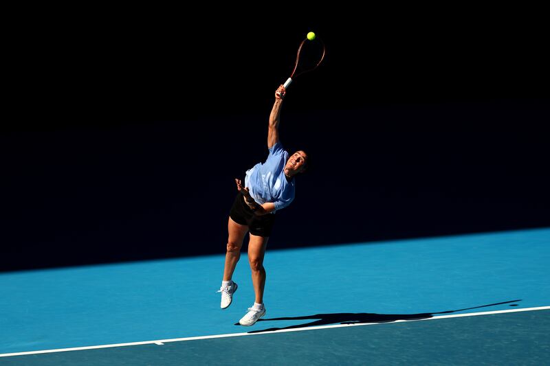 Ons Jabeur serves during a practice session at Melbourne Park. Getty