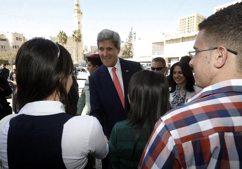 US secretary of state John Kerry (centre) near Manger Square in the West Bank city of Bethlehem.  “We consider now, and have always considered, the settlements to be illegitimate.” Jason Reed / AFP







