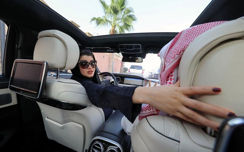 TOPSHOT - A Saudi woman practices driving in Riyadh, on April 29, 2018, ahead of the lifting of a ban on women driving in Saudi Arabia in the summer. 
In September 2017, a royal decree announced the end of a ban on women driving -- the only one of its kind in the world -- as of June 2018. / AFP PHOTO / Yousef DOUBISI