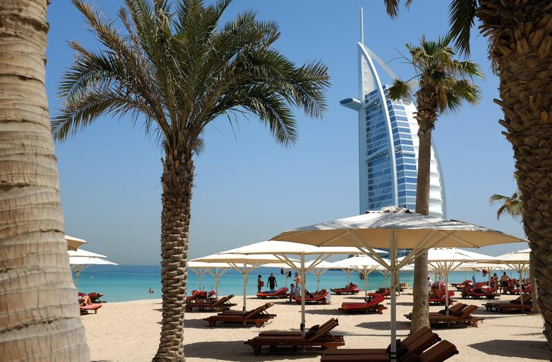 A picture taken on May 14, 2015 shows a view of Dubai's Burj al-Arab hotel seen from the Mina al-Salam beach hotel and touristic resort in Jumeirah. AFP PHOTO / PATRICK BAZ / AFP PHOTO / PATRICK BAZ