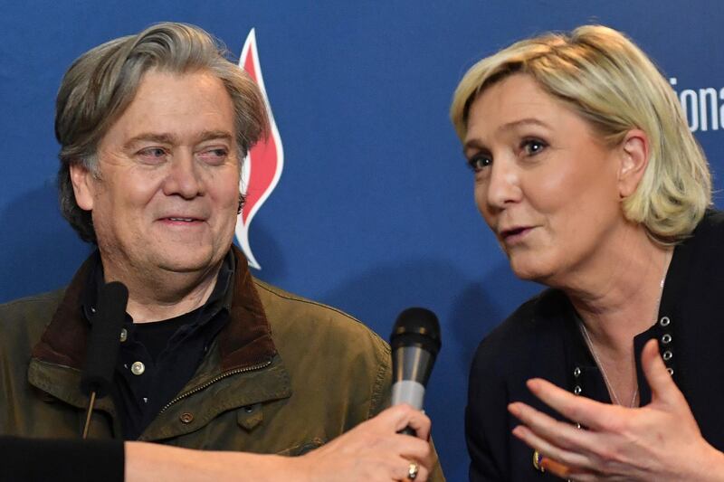 National Front party leader Marine Le Pen, right, and former White House strategist Steve Bannon hold a press conference at the party congress in the northern French city of Lille, Saturday, March 10, 2018. Steve Bannon has given a big boost to French far right leader Marine Le Pen, telling a cheering crowd at a congress of her National Front party that "history is on our side." (AP Photo)