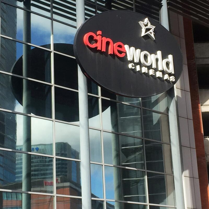 FILE PHOTO: A Cineworld cinema logo is pictured in Canary Wharf in London, Britain, March 11, 2020. REUTERS/Keith Weir/File Photo