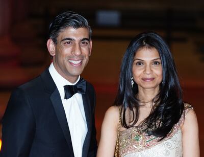 British Chancellor of the Exchequer, Rishi Sunak, with his wife Akshata Murty in February. PA