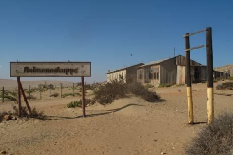 The abandoned diamond mining town of Kolmanskop, near Luderitz, Namibia, is now a tourist attraction. For Scott MacMillan's around Africa column. Photo by Scott MacMillan