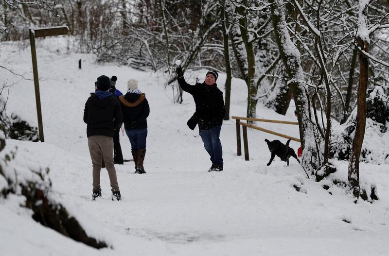 A man throws a snowball in Buxton, UK. Darren Staples/ Reuters