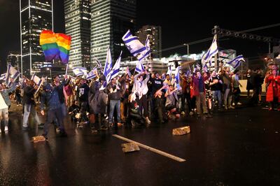 Demonstrators block a highway in protest against the government's justice system reform plans in Tel Aviv, on April 1. EPA