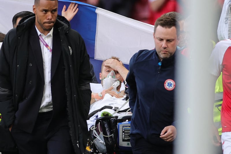 Christian Eriksen collapsed on the pitch shortly before half time during Denmark's opening Euro 2020 match against Finland in Copenhagen. Danish medical staff later admitted they 'lost' Eriksen before reviving him and later confirmed the midfielder, 29, had suffered a heart attack but that there was 'no explanation' for Eriksen's condition. AFP