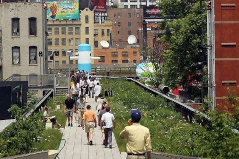 High Line Park in New York City, formerly an elevated railway on the city's West Side. Architects Elizabeth Diller and Ricardo Scofidio, subjects of the book Diller, Scofidio + Renfro, worked on the park's transformation. Spencer Platt / Getty Images / AFP