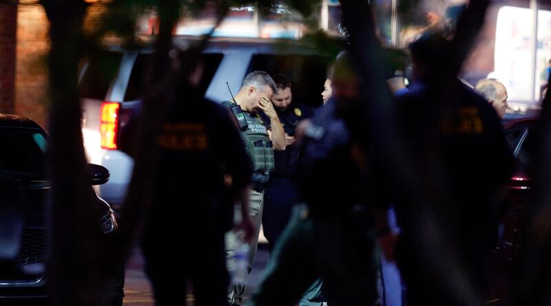 An hours-long manhunt for the gunman forced residents across several districts to take shelter in their homes. AP