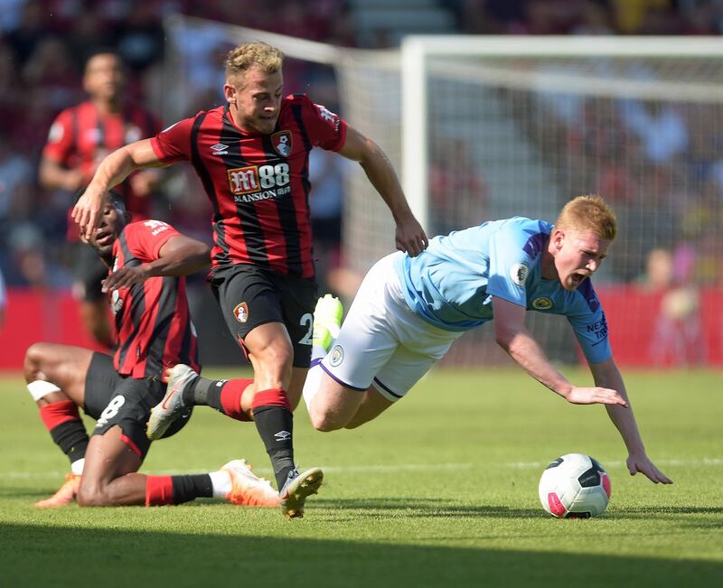 Manchester City's Kevin de Bruyne is fouled by Bournemouth's Ryan Fraser. EPA