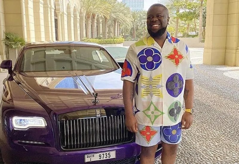 Hushpuppi with a Rolls-Royce in Dubai. The National