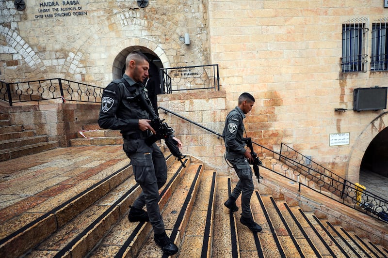 Israeli border policemen patrol the area near the site of a shooting incident in Jerusalem's Old City. Reuters