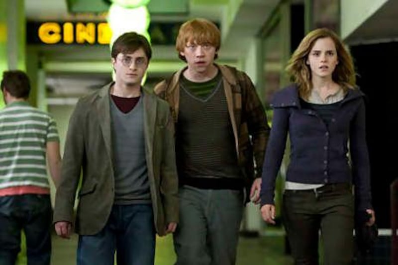(L-r) DANIEL RADCLIFFE as Harry Potter, RUPERT GRINT as Ron Weasley and EMMA WATSON as Hermione Granger in Warner Bros. Pictures’ fantasy adventure “Harry Potter and the Deathly Hallows – Part 1.”

Courtesy of Warner Brothers Pictures
