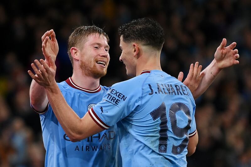 Julian Alvarez celebrates with Kevin De Bruyne after scoring the fourth goal. Getty