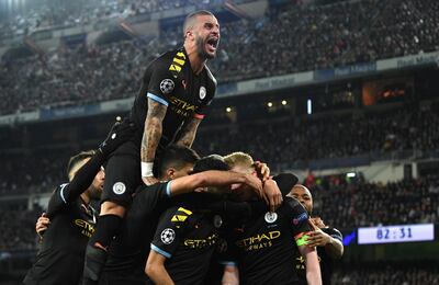 MADRID, SPAIN - FEBRUARY 26: Kyle Walker of Manchester City joins in as Kevin De Bruyne of Manchester City celebrates with teammates after scoring his team's second goal during the UEFA Champions League round of 16 first leg match between Real Madrid and Manchester City at Bernabeu on February 26, 2020 in Madrid, Spain. (Photo by David Ramos/Getty Images) *** BESTPIX ***