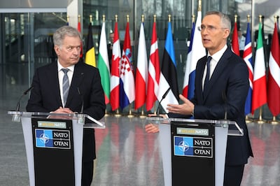 Finland's President Sauli Niinisto, left, marks his country's entry into Nato with Secretary General Jens Stoltenberg. AP 