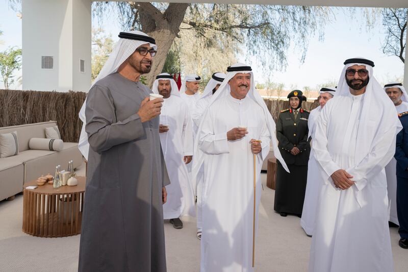 President Sheikh Mohamed, Sheikh Sultan bin Hamdan bin Mohamed, and Mohamed Ahmad Al Bowardi at the Armed Forces unification ceremony