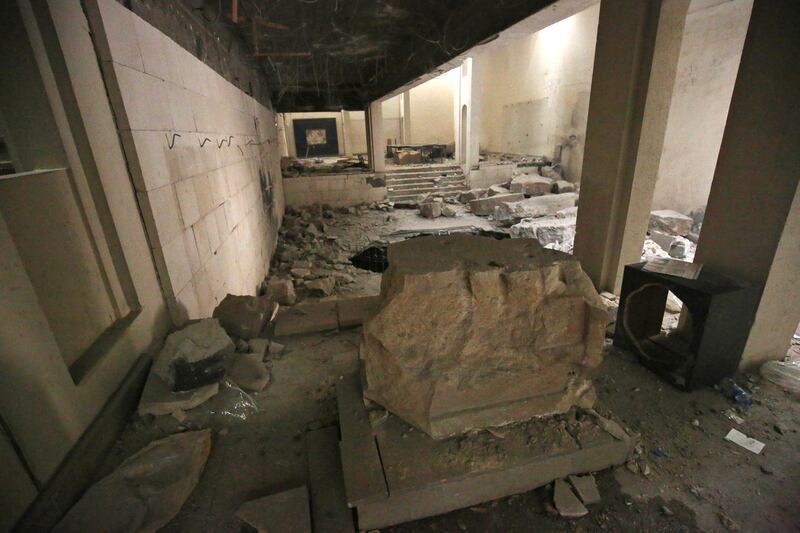 A general view shows the damage inside the destroyed museum of Mosul on March 13, 2017 after it was recaptured by Iraqi forces from Islamic State (IS) group fighters. - Iraqi forces seized the museum from IS on March 7 as they pushed into west Mosul as part of a vast offensive to oust the jihadists from the northern city. (Photo by AHMAD AL-RUBAYE / AFP)