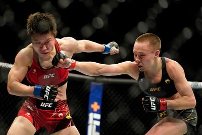 Rose Namajunas punches Weili Zhang during their bout at UFC 268 in New York. AP