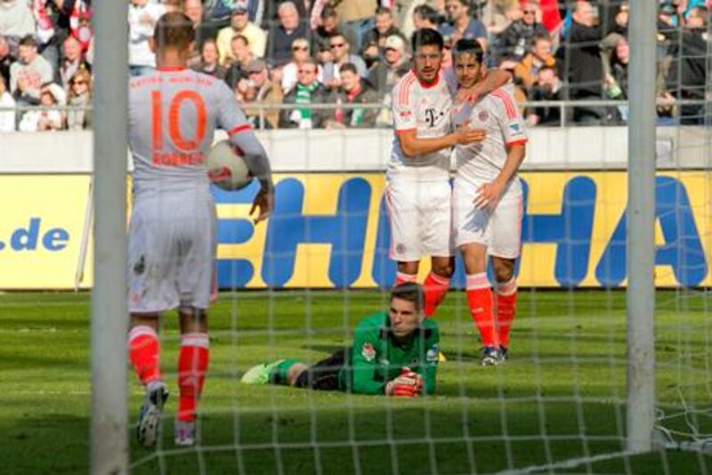 Hannover goalkeeper Ron-Robert Zieler is left disconsolate as Arjen Robben, Emre Can and Claudio Pizarro celebrate Bayern Munich's win.