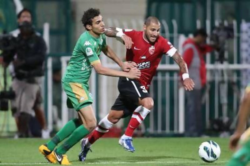 Al Ahli's Ricardo Quaresma, right, was kept in check as Al Shabab scored a morale-boosting win at the Maktoum bin Rashid Stadium. Mike Young / The National