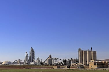 This photo taken on February 19, 2018 shows a general view shows the Lafarge Cement Syria (LCS) cement plant in Jalabiya, some 30 kms from Ain Issa, in northern Syria.  / AFP / Delil souleiman