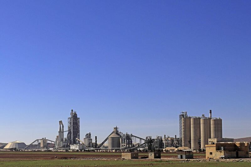 (FILES) This file photo taken on February 19, 2018 shows a general view shows the Lafarge Cement Syria (LCS) cement plant in Jalabiya, some 30 kms from Ain Issa, in northern Syria. French cement maker Lafarge is accused of having financed jihadist groups to maintain its activity in Syria and was placed under an investigation which could lead to indictment sources close to the case revealed on June 28, 2018.  / AFP / Delil souleiman

