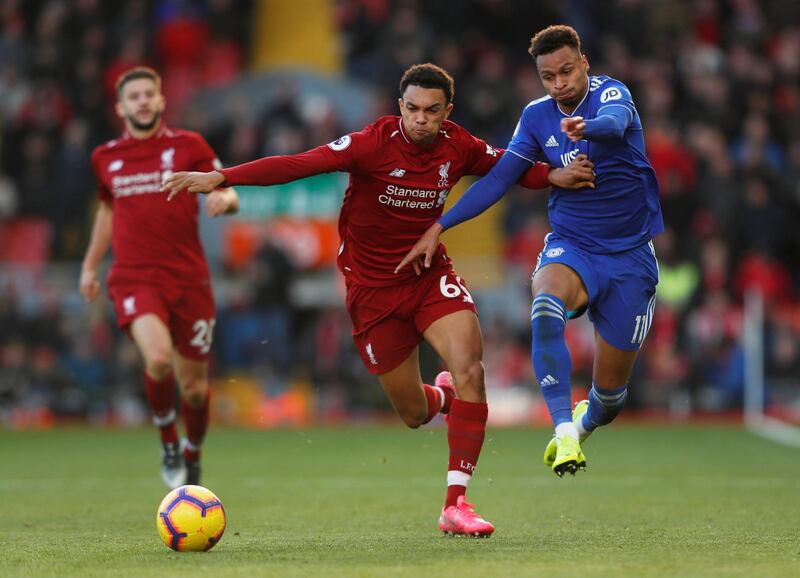 Liverpool's Trent Alexander-Arnold in action with Cardiff City's Josh Murphy. Reuters