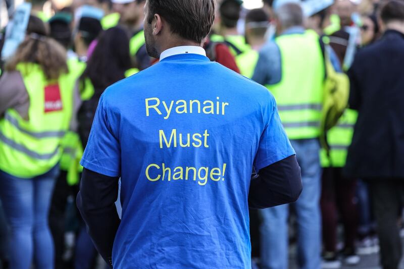 An man wears a t-shirt reading "Ryanair Must Change" during a protest at the airport in Frankfurt Main, Germany. EPA