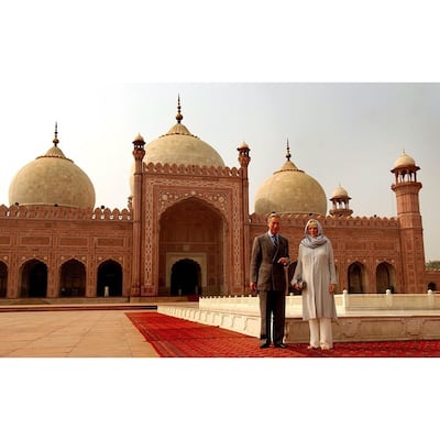 Camilla, Duchess of Cornwall and Prince Charles, Prince of Wales pose for a photograph in front of Badshai Mosque in Lahore. Instagram / Kensington Royal via Royal Collection Trust