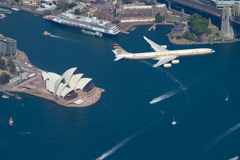 An Etihad Airways Airbus A340-600  performed a low-altitude aerial salute to Sydney Opera House as part of the iconic venue's 40th birthday celebrations. Courtesy Etihad Airways