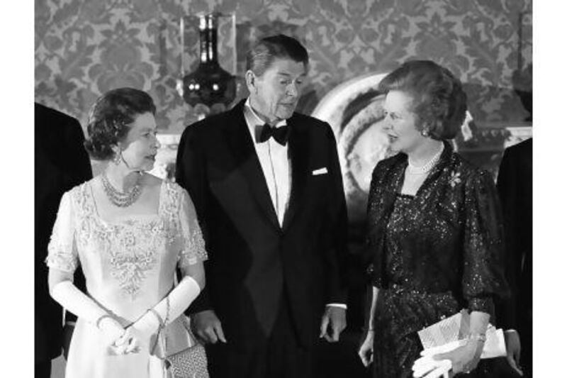 Left to right: Queen Elizabeth II, American President Ronald Reagan and British Prime Minister Margaret Thatcher at Buckingham Palace when they attended a special banquet hosted by the Queen following the London Economic Summit.