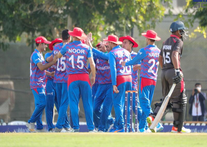Afghanistan players celebrate after bowling out the UAE in the Under-19 Asia Cup at the ICC Academy in Dubai on Saturday, December 25, 2021. ACC