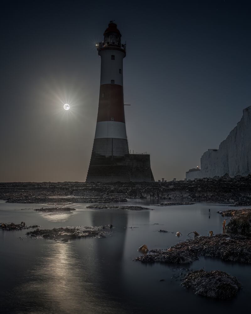 Full Moon Behind Beachy Head Lighthouse by Giles Embleton-Smith, runner-up in the Magnificent Moon category. PA