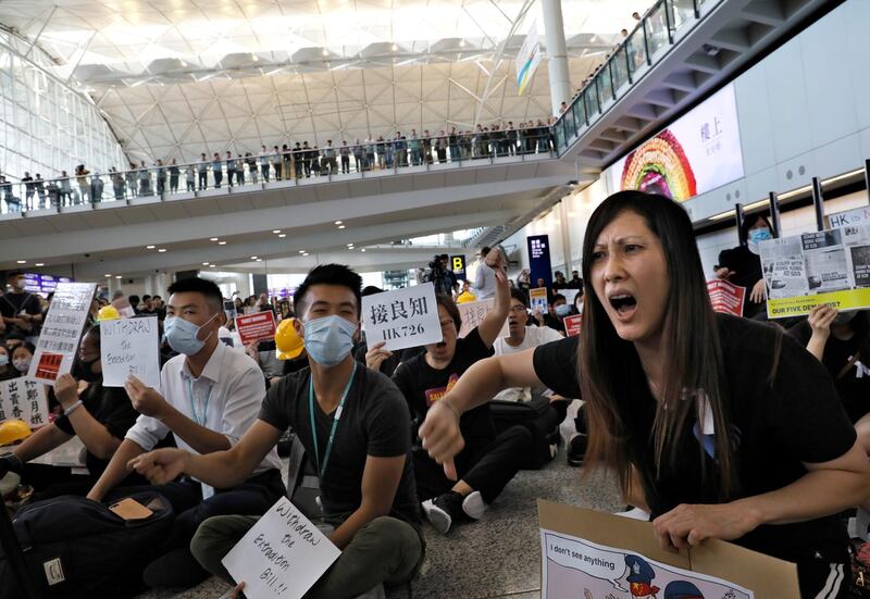 Demonstrators at Hong Kong International Airport. AP Photo