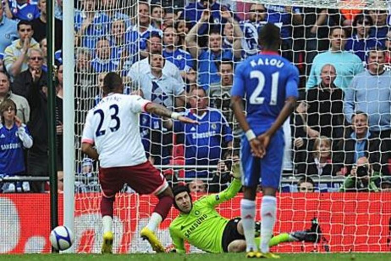 Petr Cech, the Chelsea goalkeeper, saves the penalty kick of Kevin-Prince Boateng at Wembley Stadium.