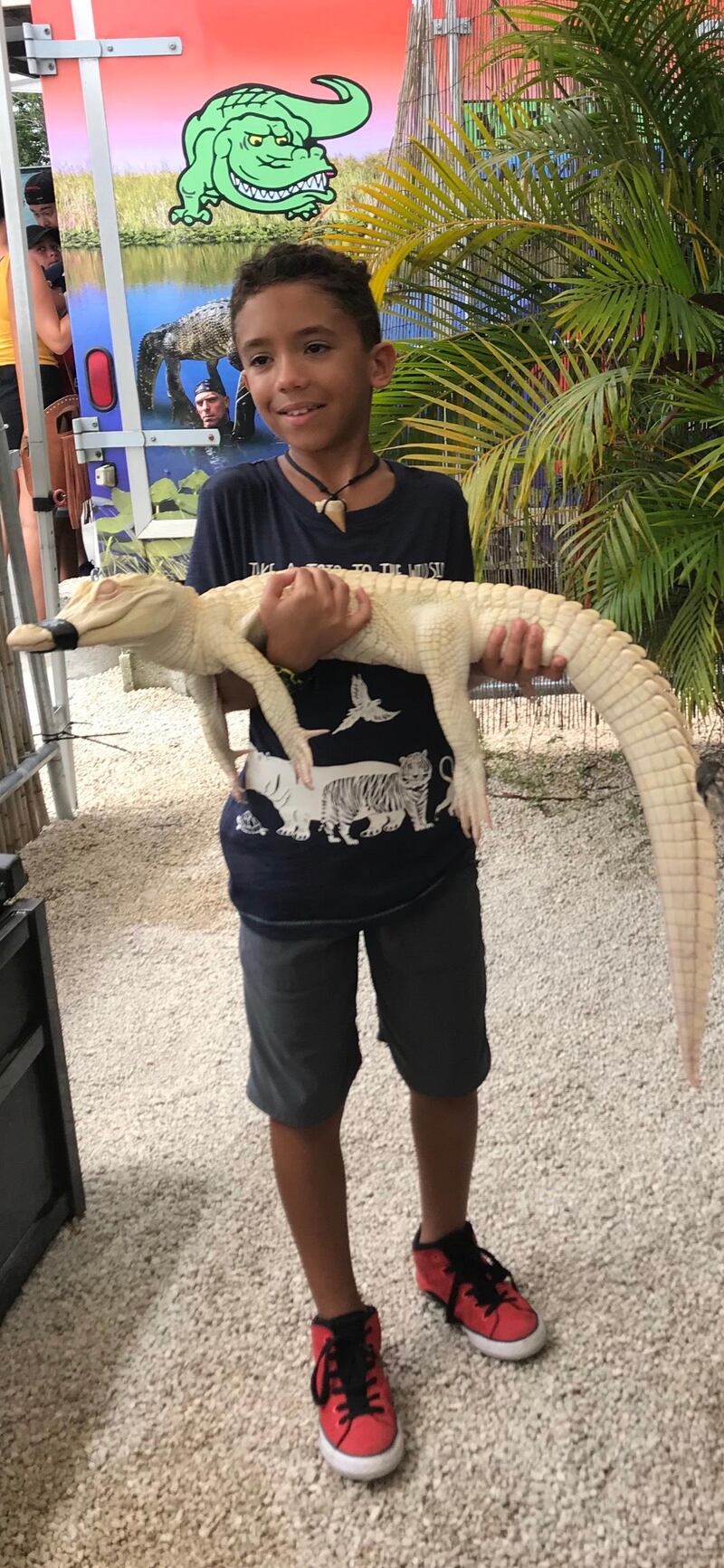 Mario in the Everglades, Florida, holding an alligator. 
Courtesy: Nani Montero
