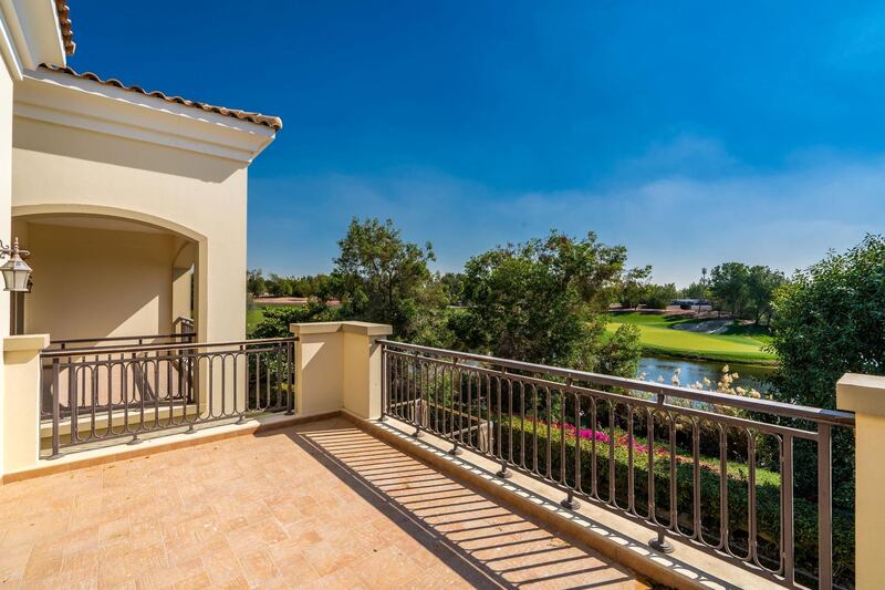 A balcony at the rear offers views across the lake. Courtesy LuxuryProperty.com