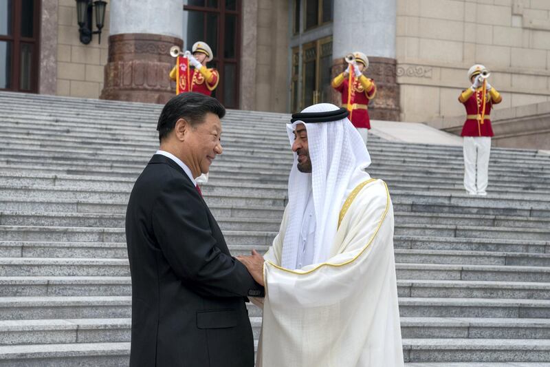 BEIJING, CHINA - July 22, 2019: HH Sheikh Mohamed bin Zayed Al Nahyan, Crown Prince of Abu Dhabi and Deputy Supreme Commander of the UAE Armed Forces (R) greets HE Xi Jinping, President of China (L), during a reception at the Great Hall of the People.

( Mohamed Al Hammadi / Ministry of Presidential Affairs )
---