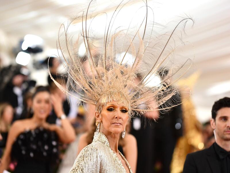 Celine Dion's feathered headpiece might take centre stage in her overall look, but she also gets bonus points for her gilded eyebrows and yellow shadow (a notoriously tricky shade to pull off). AP
