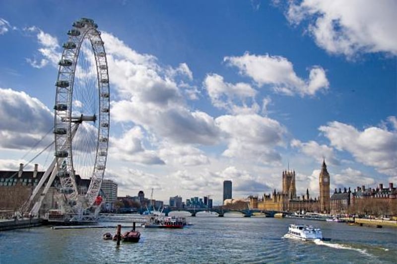 London, as viewed looking down the Thames from Charing Cross Bridge. The London Eye is pictured on the left, with the Houses of Parliament, the seat of the British government, seen on the right. Getty Images