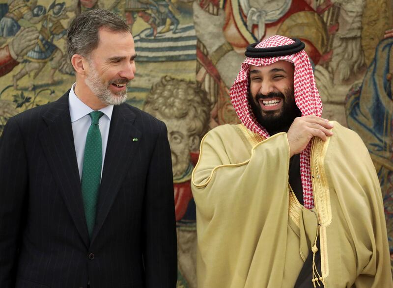 Saudi Arabia's Crown Prince Mohammed bin Salman laughs with Spain's King Felipe at the Zarzuela Palace outside Madrid, Spain April 12, 2018.  REUTERS/Sergio Perez