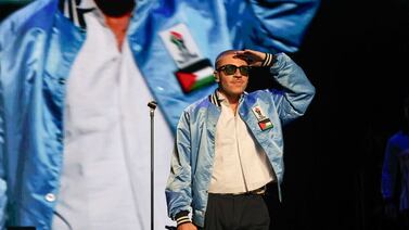 Macklemore dons support for Palestine on his jacket as he performs in Auckland, New Zealand on May 9. Getty Images