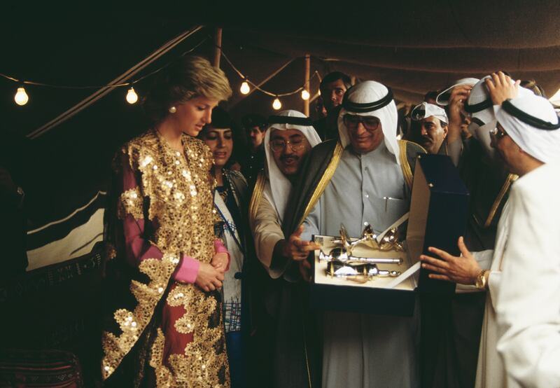 When visiting Kuwait after her UAE trip, Princess Diana was given a gold embroidered gown and a silver tea set during a visit to the museum in Kuwait City. Getty Images