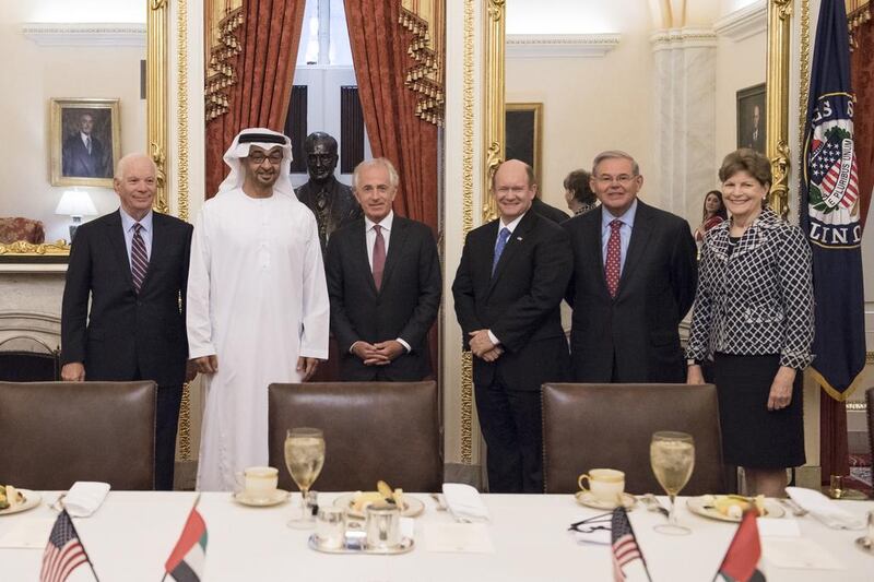Sheikh Mohammed bin Zayed, Crown Prince of Abu Dhabi and Deputy Supreme Commander of the Armed Forces, stands for a photograph with Ben Cardin US Senator for Maryland (L), Bob Corker Chairman of the United States Senate Committee on Foreign Relations and Senator for Tennessee (3rd L), Chris Coons US Senator for Delaware (4th L), Bob Menendez US Senator for New Jersey (5th L), and Jeanne Shaheen Senator for New Hampshire (6th L), prior to a lunch meeting at Capitol Hill. Rashed Al Mansoori / Crown Prince Court - Abu Dhabi