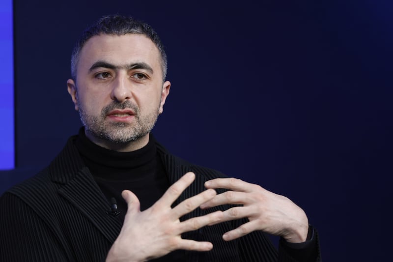 Mustafa Suleyman, co-founder and chief executive officer of Inflection AI, speaking at the event. Bloomberg