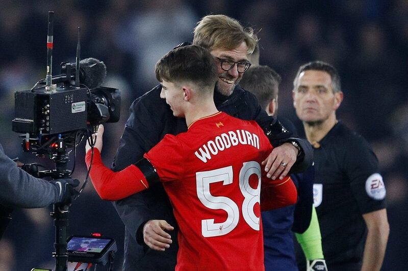 Liverpool’s Ben Woodburn and manager Jurgen Klopp celebrate after the game. Phil Noble / Reuters